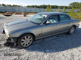 2005 Jaguar XJ with VIN SAJWA79C65SG45989, listed as a Copart auction lot 65357044 with 103,587 mi miles and Salvage Title. Bid and sale history available at carsss.com. Image 1.