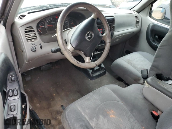 2003 Mazda B-Series Truck DS z VIN 4F4YR16V03TM05710, wystawiony jako Copart lot #54114605 z przebiegiem 187 857 mil mil oraz Szkoda całkowita • Salvage title. Historia ofert i sprzedaży dostępna na DreamBid. Obrazek 8.