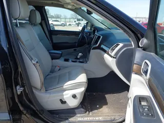2018 Jeep Grand Cherokee Summit with VIN 1C4RJEJG2JC392847, listed as a IAAI auction lot 41751452 with 136,793 mi miles and . Bid and sale history available at DreamBid. Image 5.