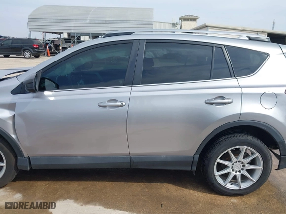 2018 Toyota RAV4 LE with VIN 2T3ZFREV2JW464807, listed as a IAAI auction lot 40966277 with 113,053 mi miles. Bid and sale history available at carsss.com. Image 15.