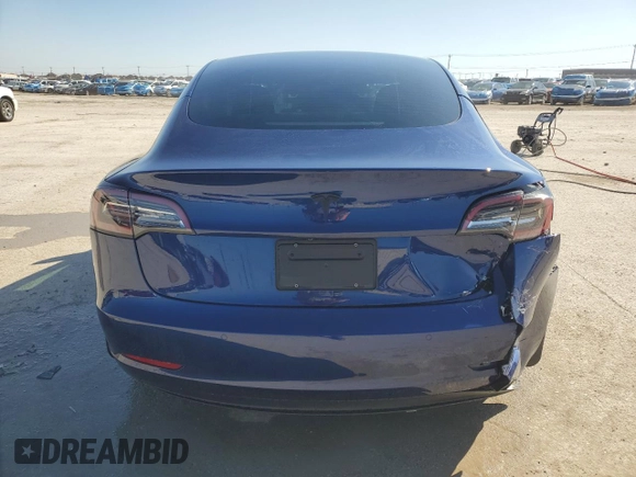 2022 Tesla Model 3 with VIN 5YJ3E1EA8NF322335, listed as a Copart auction lot 48187265 with 22,265 mi miles and Clean Title. Bid and sale history available at DreamBid. Image 6.