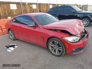 2014 BMW 4 Series 428i xDrive with VIN WBA3N5C58EK197382, listed as a IAAI auction lot 40925619 with 101,632 mi miles. Bid and sale history available at carsss.com. Image 1.
