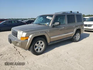 2006 Jeep Commander Limited with VIN 1J8HG58216C164763, listed as a Copart auction lot 52856365 with 97,144 mi miles and Salvage title. Bid and sale history available at DreamBid. Image 1.
