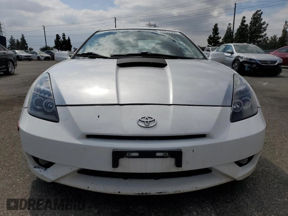 2004 Toyota Celica GT with VIN JTDDR32TX40174017, listed as a Copart auction lot 73748694 with 138,701 mi miles and Salvage Title. Bid and sale history available at DreamBid. Image 5.