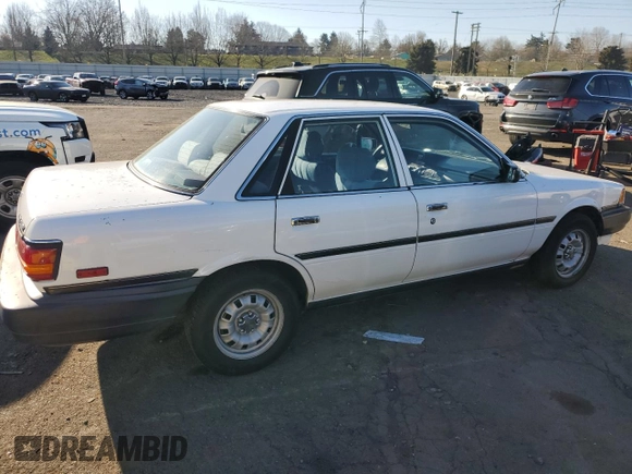 1991 Toyota Camry z VIN 4T1SV24E0MU424347, wystawiony jako Copart lot #42566695 z przebiegiem 162 334 mil mil oraz Szkoda całkowita • Salvage title. Historia ofert i sprzedaży dostępna na DreamBid. Obrazek 3.