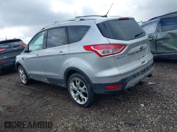 2013 Ford Escape Titanium with VIN 1FMCU9J90DUC22888, listed as a IAAI auction lot 41664550 with 185,568 mi miles and . Bid and sale history available at DreamBid. Image 3.