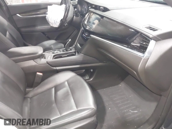 2022 Cadillac XT6 Sport with VIN 1GYKPGRS2NZ164879, listed as a IAAI auction lot 41555242 with 10,862 mi miles. Bid and sale history available at carsss.com. Image 5.