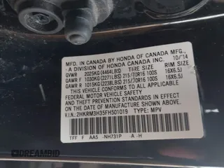 2015 Honda CR-V LX with VIN 2HKRM3H35FH501019, listed as a IAAI auction lot 41014683 with 111,168 mi miles and . Bid and sale history available at carsss.com. Image 9.