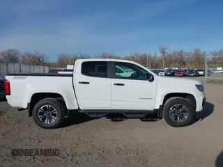 2021 Chevrolet Colorado 4WD Z71 z VIN 1GCGTDEN3M1234781, wystawiony jako IAAI lot #41086044 z przebiegiem 45 010 mil mil oraz . Historia ofert i sprzedaży dostępna na DreamBid. Obrazek 14.