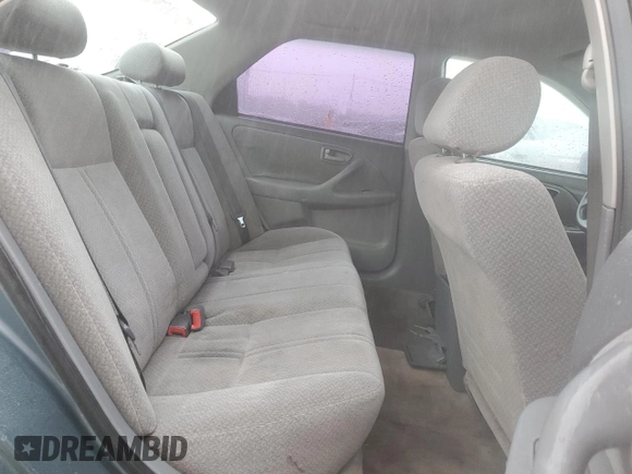 2001 Toyota Camry CE z VIN JT2BG22K710561238, wystawiony jako Copart lot #56686255 z przebiegiem Nie podano mil oraz Szkoda całkowita • Salvage title. Historia ofert i sprzedaży dostępna na DreamBid. Obrazek 10.