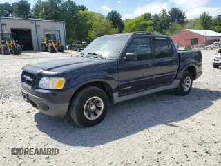 2001 Ford Explorer Sport Trac z VIN 1FMZU77E61UB01605, wystawiony jako Copart lot #56976175 z przebiegiem 106 313 mil mil oraz Tytuł czysty. Historia ofert i sprzedaży dostępna na DreamBid. Obrazek 1.