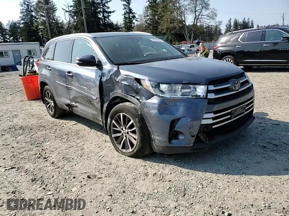 2019 Toyota Highlander SE z VIN 5TDJZRFH1KS959998, wystawiony jako Copart lot #54558795 z przebiegiem 50 566 mil mil oraz Szkoda całkowita • Salvage title. Historia ofert i sprzedaży dostępna na DreamBid. Obrazek 14.