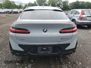 2022 BMW X4 M40i with VIN 5UX43DT07N9K16019, listed as a Copart auction lot 58804973 with 0 mi miles. Bid and sale history available at carsss.com. Image 6.