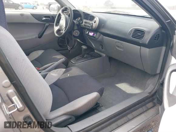 2001 Honda Insight z VIN JHMZE14741T003228, wystawiony jako IAAI lot #41432511 z przebiegiem 227 809 mil mil oraz . Historia ofert i sprzedaży dostępna na DreamBid. Obrazek 5.