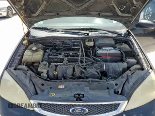 2006 Ford Focus S z VIN 1FAFP34N26W145565, wystawiony jako Copart lot #60091675 z przebiegiem 251 850 mil mil oraz Szkoda całkowita • Salvage title. Historia ofert i sprzedaży dostępna na DreamBid. Obrazek 11.