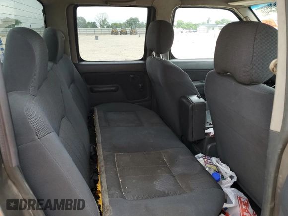 2004 Nissan Frontier XE with VIN 1N6ED29X64C410535, listed as a Copart auction lot 54222955 with 228,914 mi miles and Salvage title. Bid and sale history available at DreamBid. Image 10.