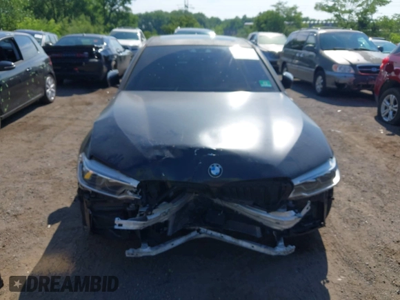 2018 BMW 5 Series M550i xDrive with VIN WBAJB9C55JB286747, listed as a IAAI auction lot 42583106 with 141,102 mi miles and . Bid and sale history available at DreamBid. Image 12.