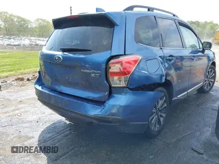 2017 Subaru Forester Touring with VIN JF2SJGWC5HH567870, listed as a IAAI auction lot 42007542 with 76,560 mi miles. Bid and sale history available at carsss.com. Image 4.