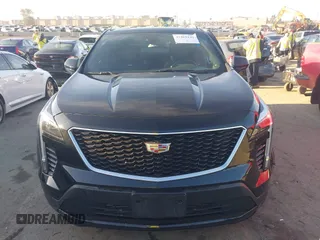2019 Cadillac XT4 FWD Sport z VIN 1GYFZER43KF183181, wystawiony jako IAAI lot #41869141 z przebiegiem 25 539 mil mil oraz . Historia ofert i sprzedaży dostępna na DreamBid. Obrazek 12.