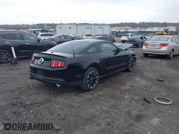 2012 Ford Mustang Premium with VIN 1ZVBP8AM7C5249954, listed as a IAAI auction lot 41881033 with 119,887 mi miles and . Bid and sale history available at DreamBid. Image 4.