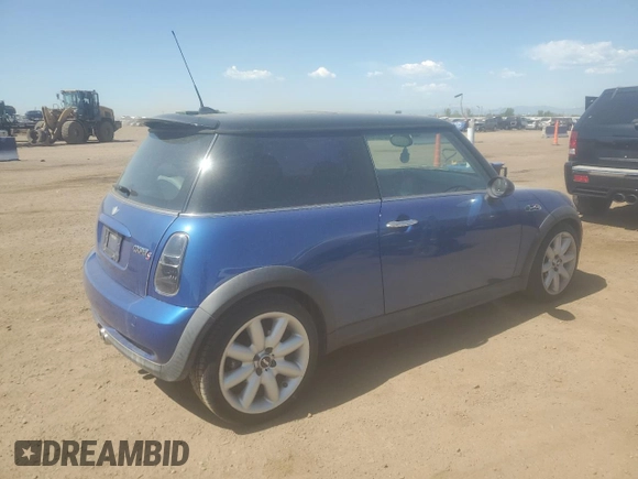 2005 MINI Hardtop S with VIN WMWRE33415TD90833, listed as a Copart auction lot 61238165 with 174,647 mi miles and Salvage title. Bid and sale history available at DreamBid. Image 3.