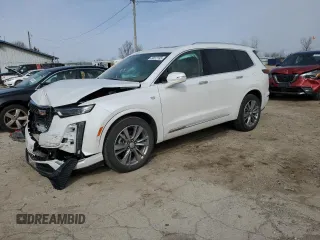 2022 Cadillac XT6 Premium Luxury with VIN 1GYKPFRS1NZ149557, listed as a Copart auction lot 49612165 with 31,425 mi miles and Salvage Title. Bid and sale history available at carsss.com. Image 1.