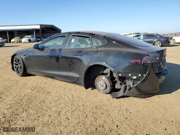 2023 Tesla Model S with VIN 5YJSA1E52PF499802, listed as a Copart auction lot 88585675 with 0 mi miles and Salvage Title. Bid and sale history available at carsss.com. Image 2.