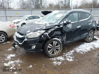 2015 Hyundai Tucson SE with VIN KM8JU3AG5FU965245, listed as a IAAI auction lot 41565341 with 197,787 mi miles. Bid and sale history available at carsss.com. Image 17.