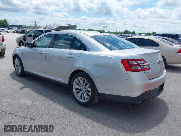 2013 Ford Taurus Limited with VIN 1FAHP2F8XDG117448, listed as a IAAI auction lot 39585596 with 150,747 mi miles and . Bid and sale history available at DreamBid. Image 3.
