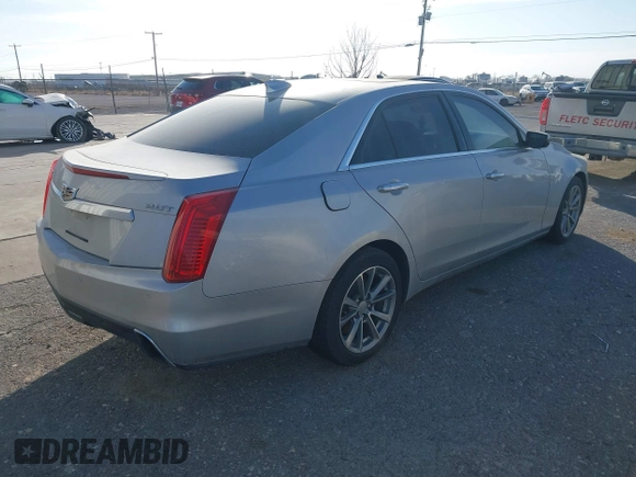 2019 Cadillac CTS Luxury RWD with VIN 1G6AR5SX7K0110826, listed as a IAAI auction lot 41596118 with 58,387 mi miles and . Bid and sale history available at DreamBid. Image 4.