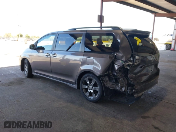 2015 Toyota Sienna SE with VIN 5TDXK3DC1FS667924, listed as a IAAI auction lot 42062805 with 123,504 mi miles. Bid and sale history available at carsss.com. Image 3.