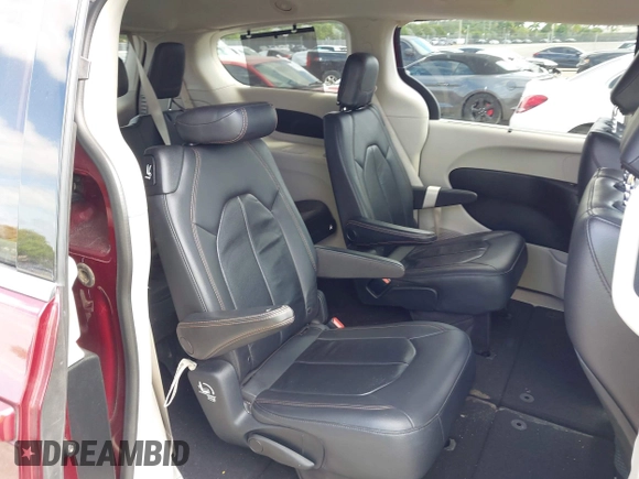 2017 Chrysler Pacifica Touring L with VIN 2C4RC1BG6HR739602, listed as a IAAI auction lot 42085250 with 96,377 mi miles and . Bid and sale history available at DreamBid. Image 8.