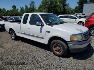 2002 Ford F-150 XL with VIN 1FTRX17L42NB56461, listed as a Copart auction lot 59988885 with 244,057 mi miles and Clean title. Bid and sale history available at DreamBid. Image 4.