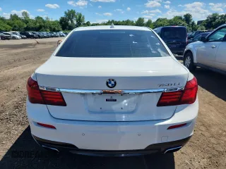 2015 BMW 7 Series 750Li with VIN WBAYE8C59FD782291, listed as a Copart auction lot 65119745 with 159,479 mi miles and Salvage title. Bid and sale history available at DreamBid. Image 6.