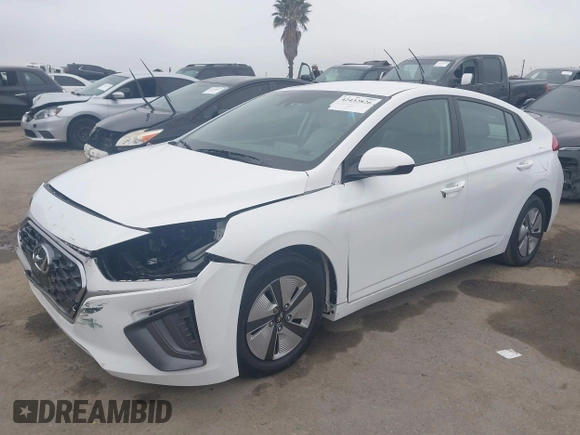 2022 Hyundai Ioniq Blue with VIN KMHC65LC7NU280672, listed as a IAAI auction lot 42432826 with 11,486 mi miles and . Bid and sale history available at DreamBid. Image 2.