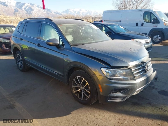 2020 Volkswagen Tiguan SE with VIN 3VV2B7AX9LM151977, listed as a IAAI auction lot 41448053 with 69,194 mi miles. Bid and sale history available at carsss.com. Image 1.
