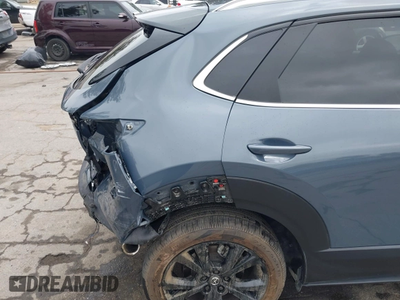 2022 Mazda CX-30 S Carbon Edition with VIN 3MVDMBCL0NM456154, listed as a IAAI auction lot 42153202 with 40,372 mi miles and . Bid and sale history available at DreamBid. Image 6.