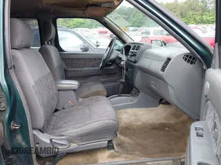 2000 Nissan Frontier XE with VIN 1N6ED27T5YC429406, listed as a IAAI auction lot 42150671 with 303,869 mi miles and . Bid and sale history available at DreamBid. Image 5.