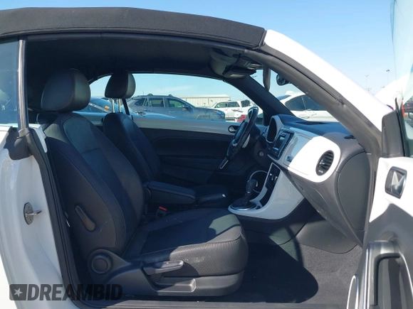 2019 Volkswagen Beetle S with VIN 3VW5DAAT0KM507437, listed as a IAAI auction lot 41380821 with 28,010 mi miles and . Bid and sale history available at DreamBid. Image 5.