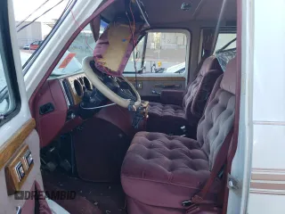 1990 Chevrolet Chevy Van z VIN 2GBEG25KXL4156338, wystawiony jako Copart lot #73499394 z przebiegiem 113 455 mil mil oraz Szkoda całkowita • Salvage title. Historia ofert i sprzedaży dostępna na DreamBid. Obrazek 7.