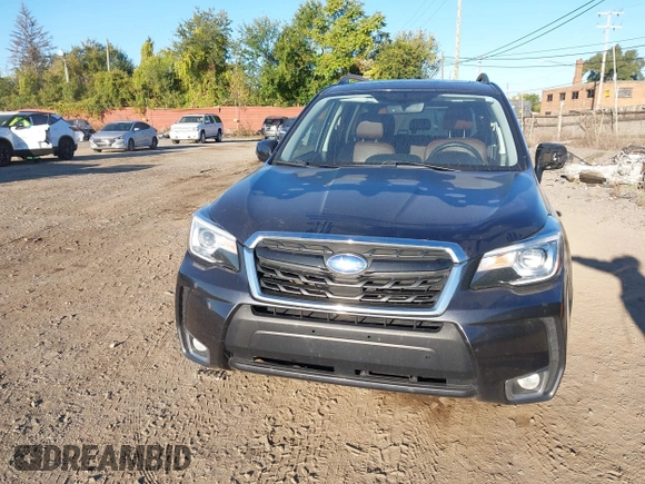 2017 Subaru Forester Touring with VIN JF2SJGTC3HH516646, listed as a IAAI auction lot 40560446 with 85,842 mi miles. Bid and sale history available at carsss.com. Image 12.