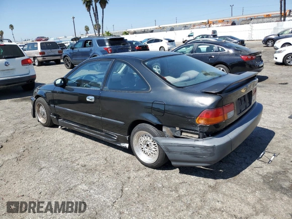 1997 Honda Civic DX with VIN 1HGEJ6128VL083271, listed as a Copart auction lot 72088024 with 329,655 mi miles and Salvage Title. Bid and sale history available at carsss.com. Image 2.