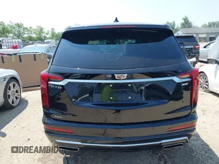 2021 Cadillac XT6 Premium Luxury with VIN 1GYKPDRS0MZ153523, listed as a IAAI auction lot 42770895 with 19,843 mi miles and . Bid and sale history available at DreamBid. Image 16.