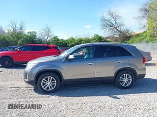 2015 Kia Sorento LX with VIN 5XYKTCA63FG654739, listed as a IAAI auction lot 42081544 with 121,024 mi miles. Bid and sale history available at carsss.com. Image 14.