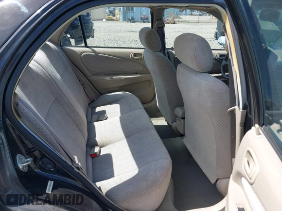 1999 Toyota Corolla VE z VIN 1NXBR12E9XZ205120, wystawiony jako IAAI lot #42216177 z przebiegiem 175 508 mil mil oraz . Historia ofert i sprzedaży dostępna na DreamBid. Obrazek 8.