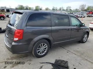 2014 Dodge Grand Caravan SXT 30th Anniversary with VIN 2C4RDGCG4ER285294, listed as a Copart auction lot 52109205 with 196,331 mi miles and Salvage Title. Bid and sale history available at DreamBid. Image 3.