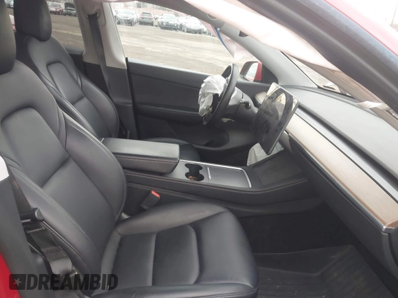 2022 Tesla Model Y Long Range with VIN 7SAYGDEE1NF442159, listed as a IAAI auction lot 41674506 with 82,355 mi miles and . Bid and sale history available at DreamBid. Image 5.