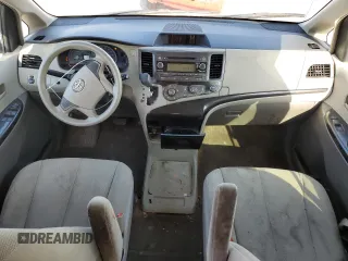 2012 Toyota Sienna with VIN 5TDKA3DC3CS011118, listed as a Copart auction lot 52087475 with 208,146 mi miles and Salvage Title. Bid and sale history available at DreamBid. Image 8.