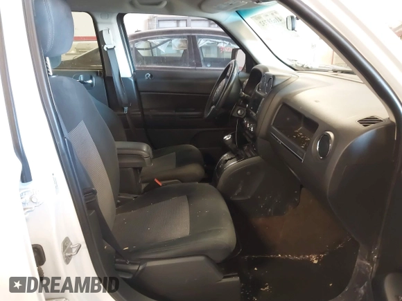 2014 Jeep Patriot Latitude with VIN 1C4NJRFB4ED864114, listed as a IAAI auction lot 41639732 with 103,119 mi miles. Bid and sale history available at carsss.com. Image 5.