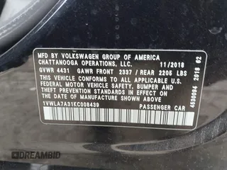 2019 Volkswagen Passat 2.0T Wolfsburg Edition with VIN 1VWLA7A31KC008439, listed as a IAAI auction lot 41472658 with 105,164 mi miles. Bid and sale history available at carsss.com. Image 9.